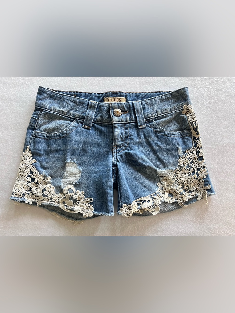 GUESS Light Blue Denim Shorts with Cream Crochet Accent